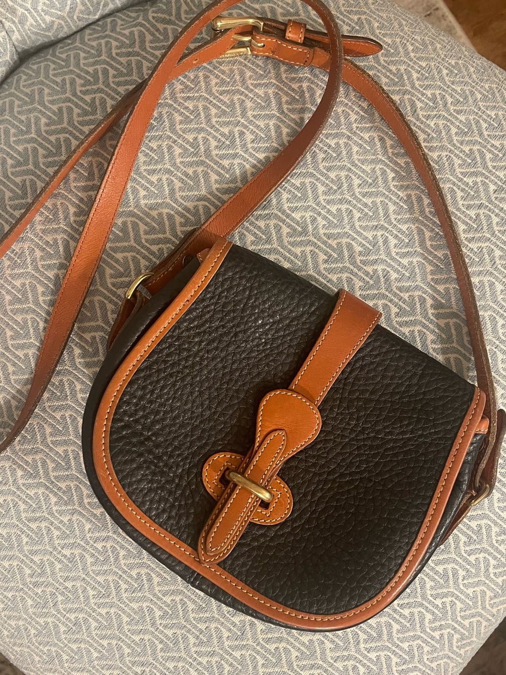 Dooney & Bourke Black and Brown Pebbled Leather Crossbody Saddle Bag vguc